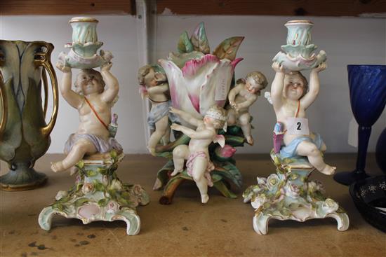 Late 19th century Continental three piece porcelain garniture comprising a tulip vase & a pair of side candlesticks